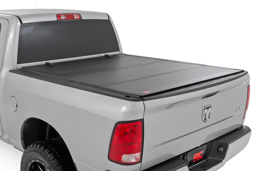 Rough Country Hard Flip Up Tonneau Cover for Ram 1500, Classic (2009-2018) - Fits 5'7" (67.4") Bed, Weather-Resistant, Tri-Fold Aluminum Panels