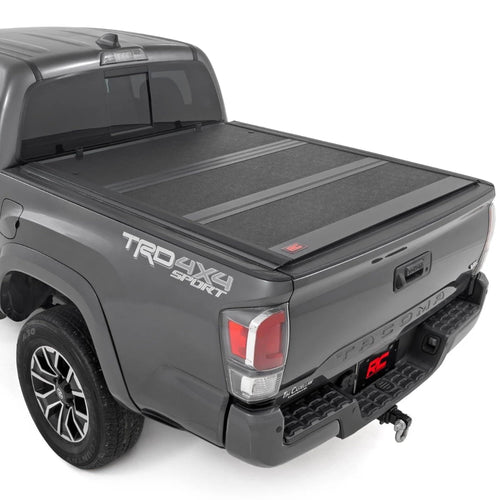 Low-Profile Rough Country Hard Tri-Fold Tonneau Cover for Toyota Tacoma (2016–2023) - Aluminum Truck Bed Cover, Fits 6' Bed (72.5")