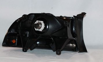 Left TYC Headlight Assembly Compatible with 1997-2004 Dodge Dakota