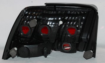 Right TYC Tail Light Assembly Compatible with 1999-2004 Ford Mustang