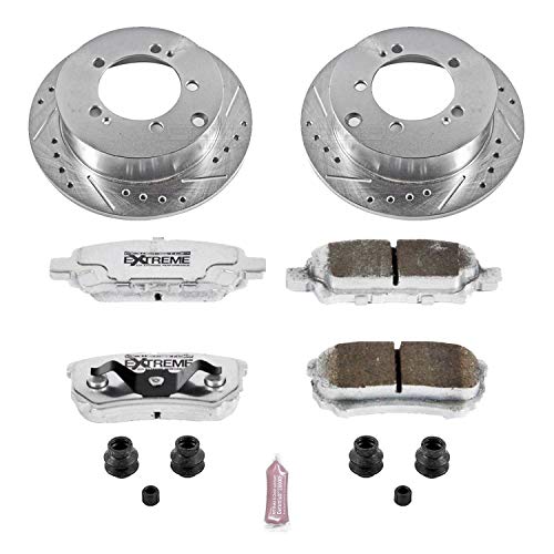 Rear Power Stop K1202-26 Z26 Carbon Fiber Brake Pads with Drilled & Slotted Brake Rotors Kit For Mitsubishi Lancer 2004-2006, Mitsubishi Outlander 2005-2006 [Model Specific]