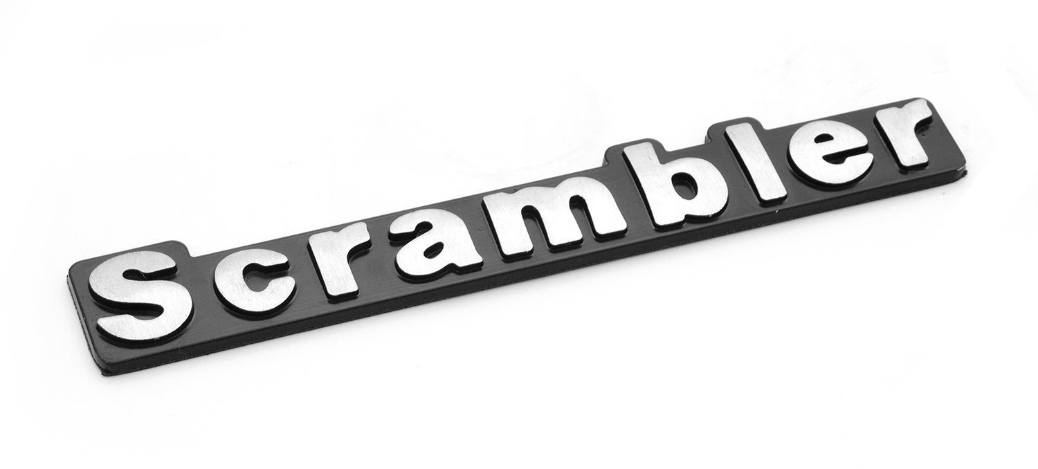 DMC-5763509 | Omix-ADA | Emblem, Scrambler | Fits 1981-1986 Jeep CJ8 Scrambler