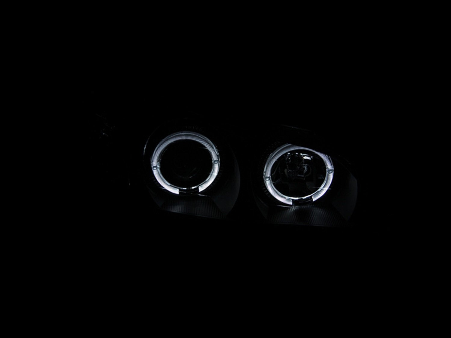 Infiniti I30 Anzo USA 121077 Projector with Halo Black Headlight Assembly - (Sold in Pairs)