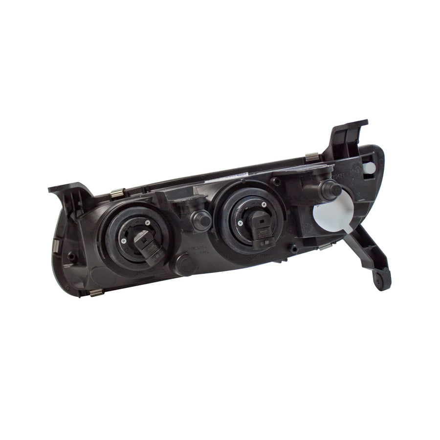 Passenger Side TYC 20-5945-00 Saturn Headlight Assembly
