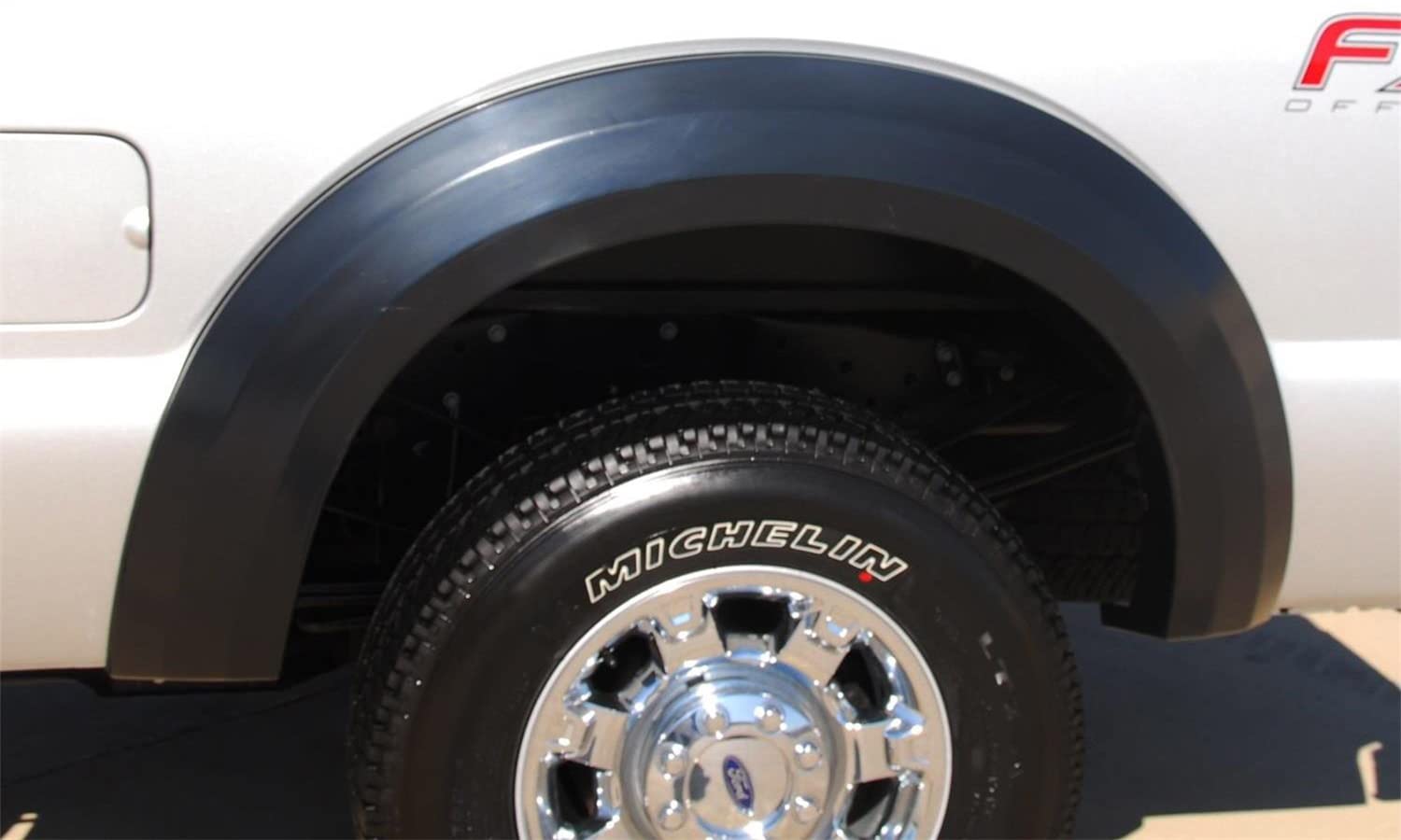 Lund Elite Series EX314S Black Extra Wide Style Standard Front and Rear Fender Flare - 4 Piece