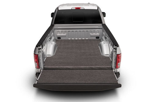 XLT Bedmat BedRug | Fits 2019 - 2025 Chevrolet Silverado / GMC Sierra 1500 New Body w/Out Mlti-Pro Tlgte, w/Out CarbonPro Bed 69.9 Bed, Models w/Non Liner / Spray-In | Charcoal Grey, XLTBMC19CCS