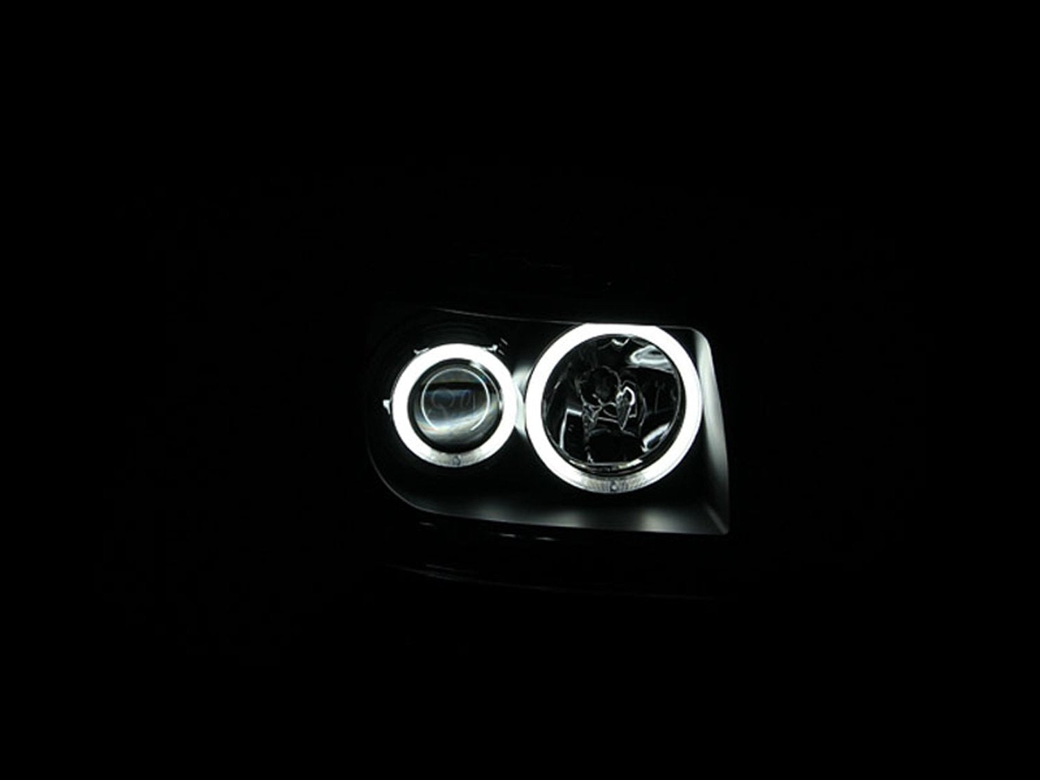 Dodge Nitro Anzo USA 111140 Projector Halo Black Clear Amber Headlight Assembly - (Sold in Pairs)
