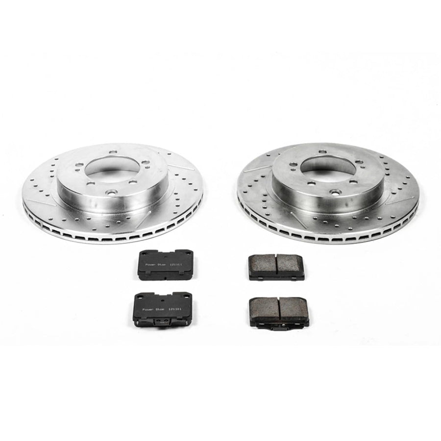 Rear Power Stop K1226 Z23 Carbon Fiber Brake Pads with Drilled & Slotted Brake Rotors Kit For Dodge Stealth 1994-1996, Mitsubishi 3000GT 1994-1999 [Model Specific]