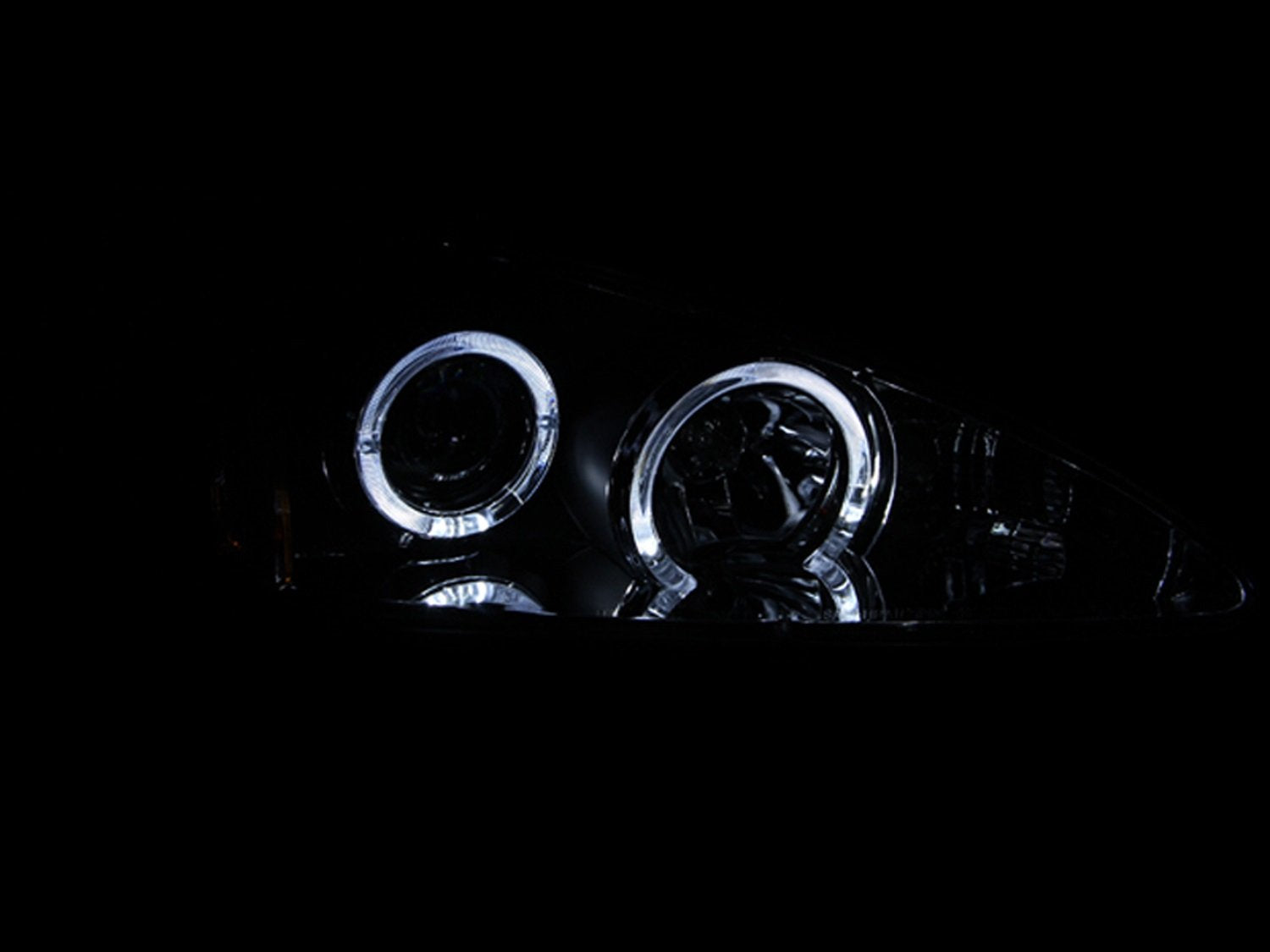 Black Clear AnzoUSA Projector Halo Headlight with LED for Pontiac Grand Am - (Sold in Pairs)