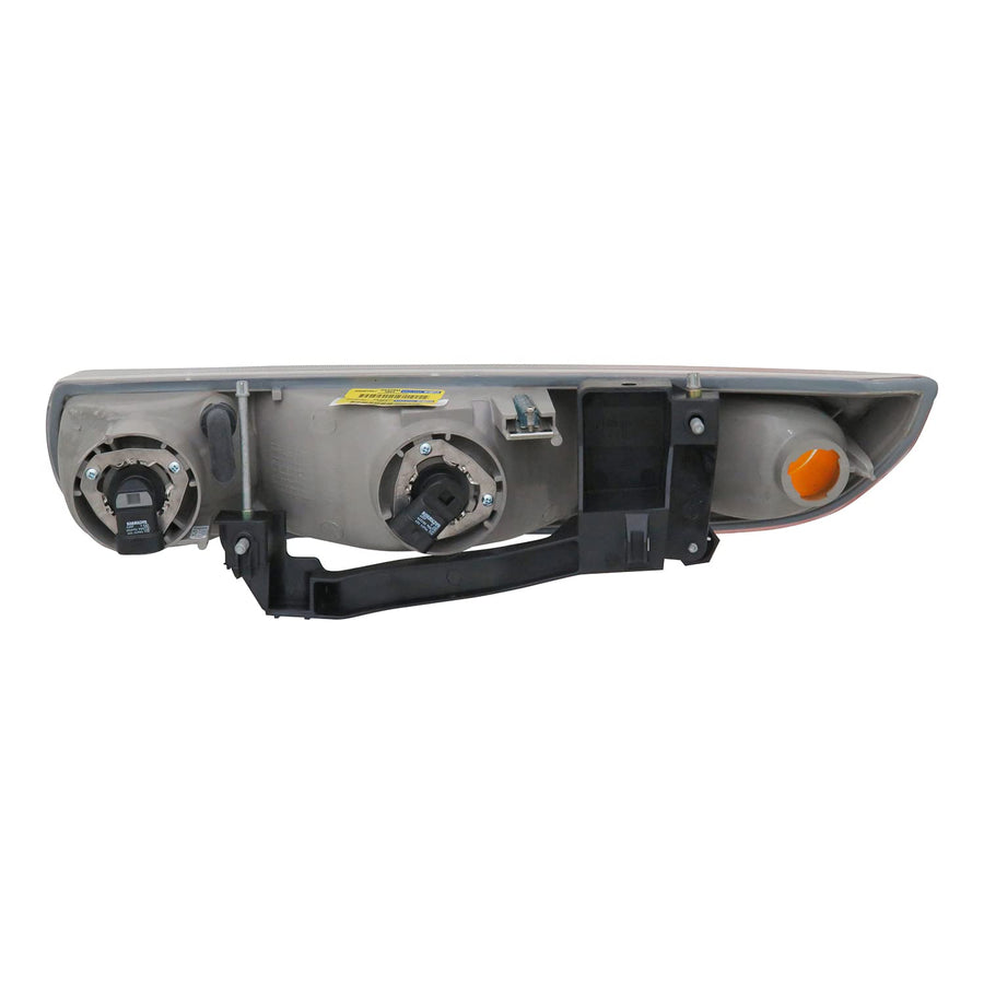 Passenger Side TYC 20-6015-00 Saturn Headlight Assembly