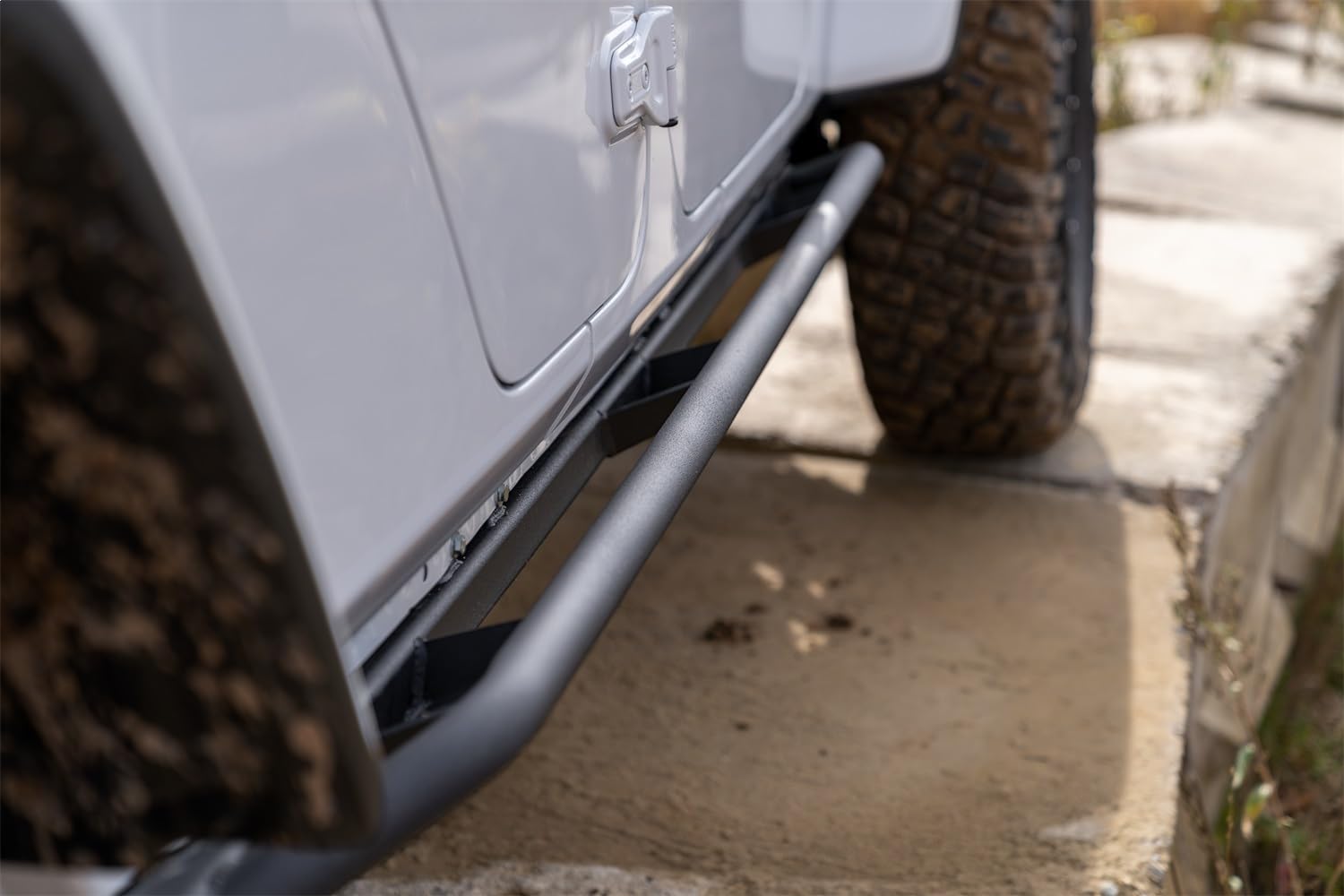 Trail Sliders RealTruck for Jeep Gladiator JT | Cab Length, Heavy Duty 2" Tubing, Textured Black | TSJ194-TX | Fits 2020 - 2025 Jeep Gladiator JT 4 Door