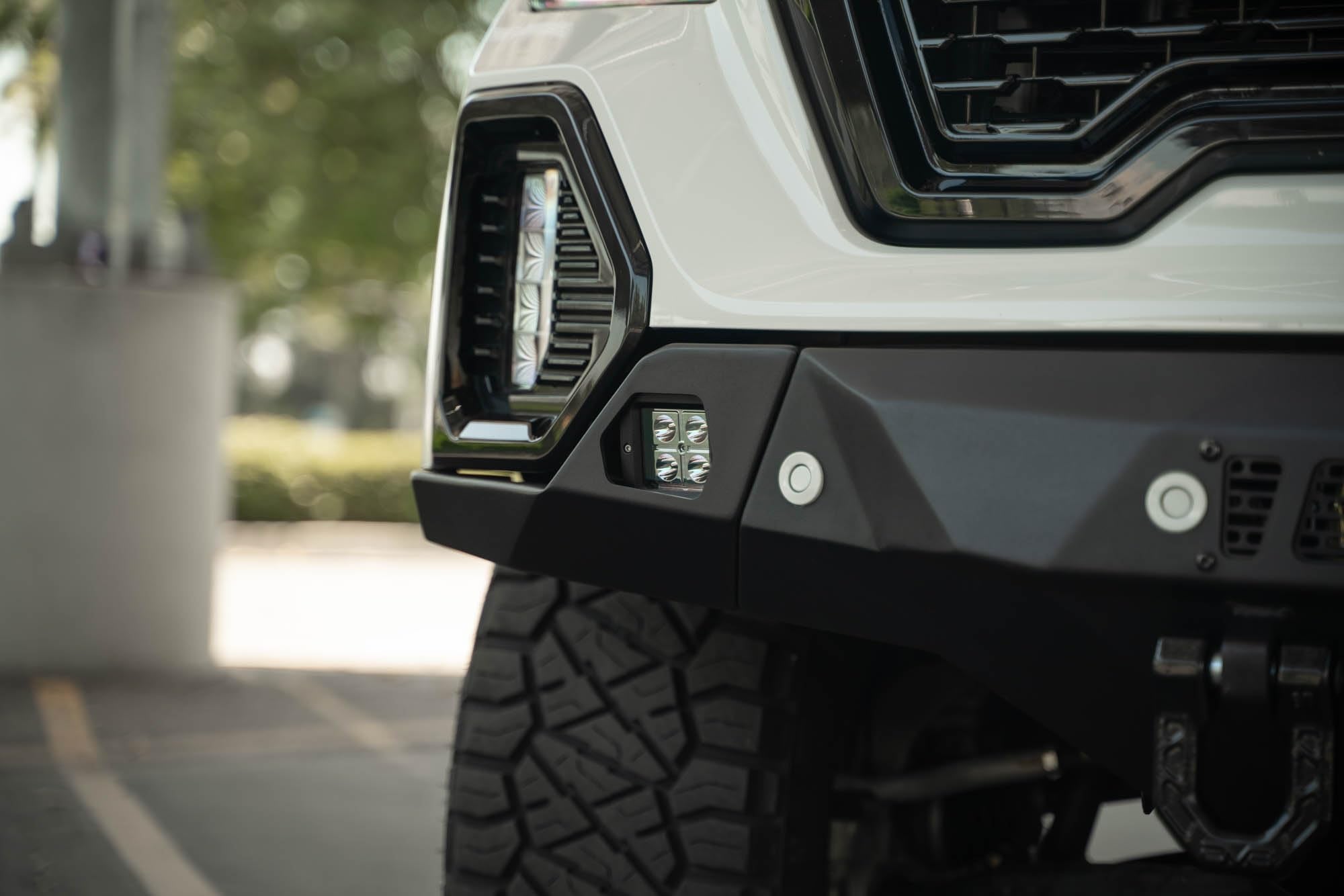 Front Bumper DV8 Spec Series for 2019-2021 GMC Sierra 1500 | Steel Front Skid Plate | One 20" Light Bar Mount | Two 3" Pod Light Mounts | Heavy-Duty Winch Mount | 2 D-Ring Mounts | Powder Coated Black