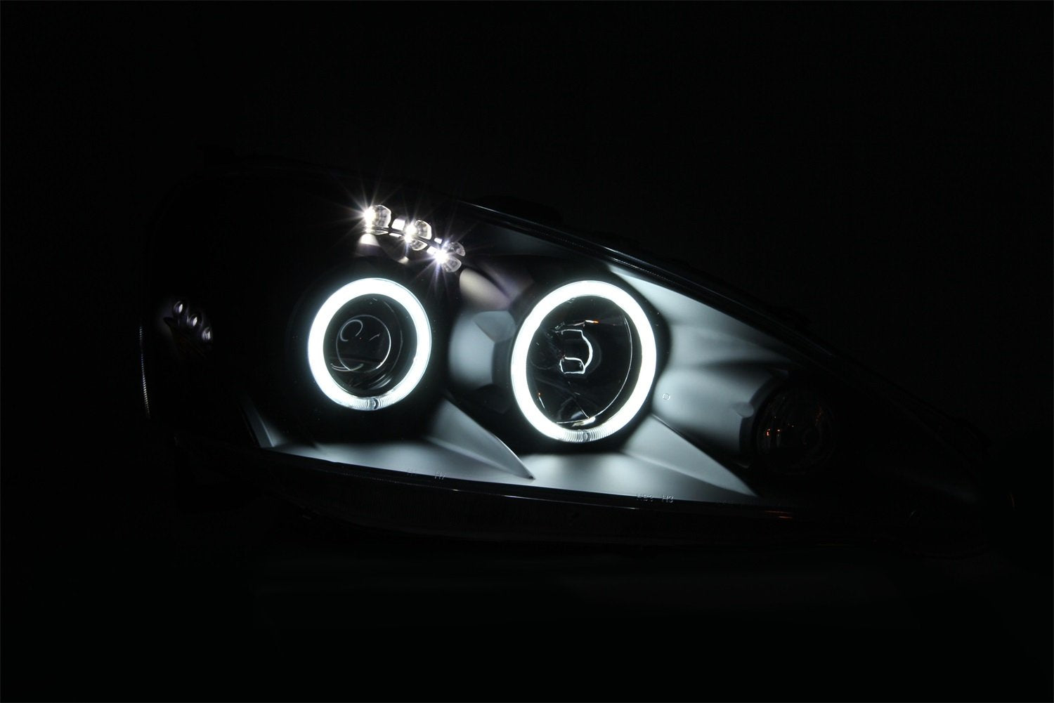 Acura RSX Anzo USA 121197 Projector with Halo Black Clear Headlight Assembly - (Sold in Pairs)