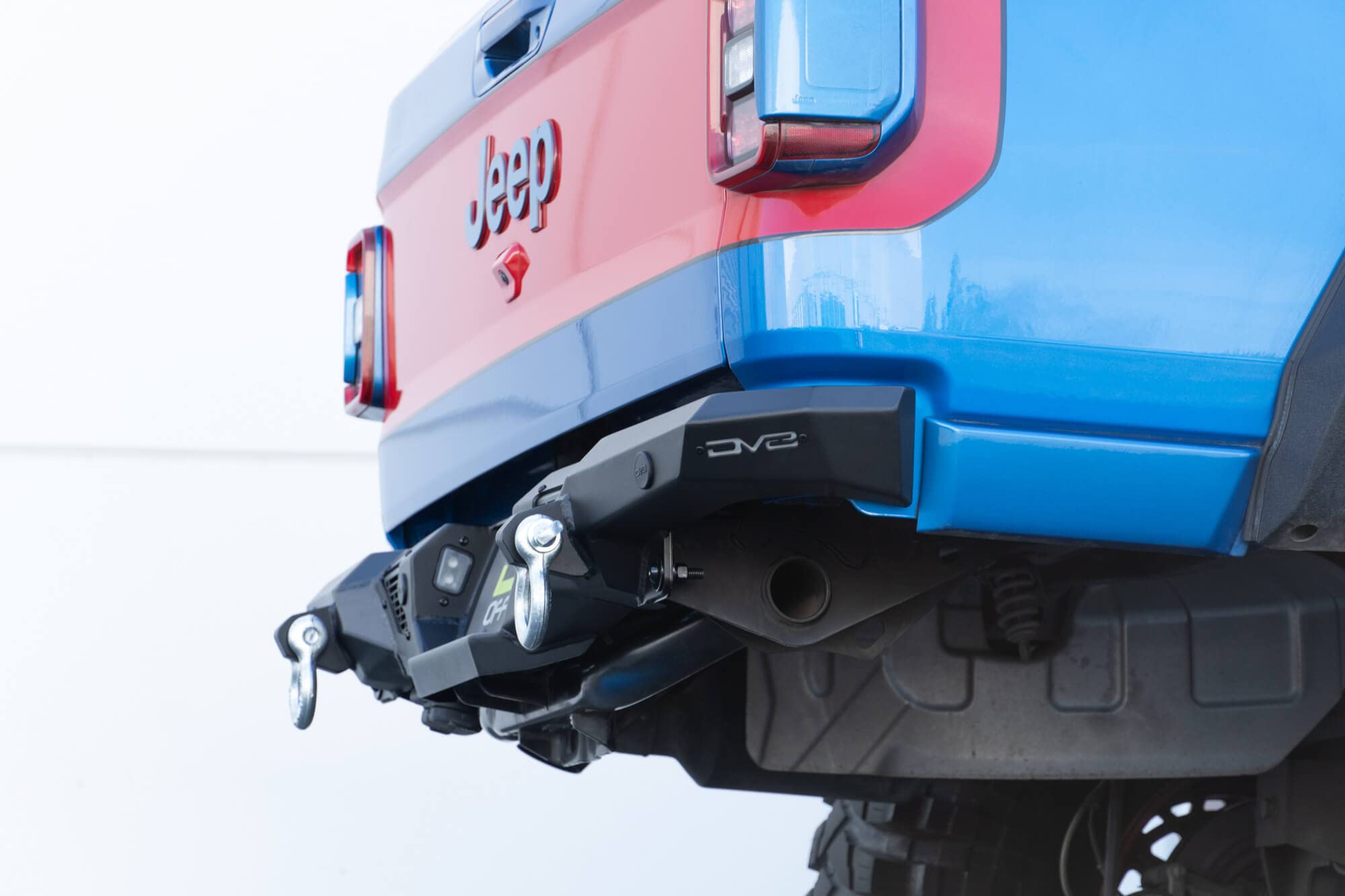 DV8 Offroad Rear Bumper Spec Series for 2020-2025 Jeep Gladiator JT | High Clearance Design | Accepts (2) up to 3" Pod Lights | Compatible OEM Hitch & Factory Sensors | ¾” D-Ring Shackles
