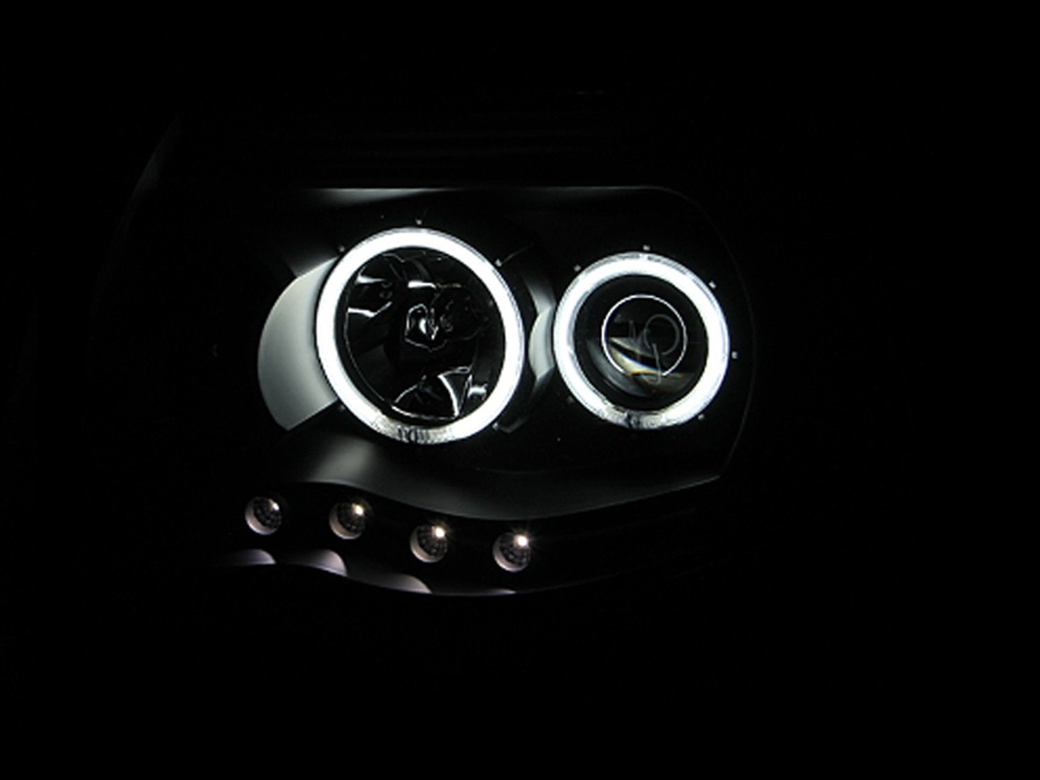 Black Clear AnzoUSA Projector Halo Headlight for Toyota Tacoma - (Sold in Pairs)