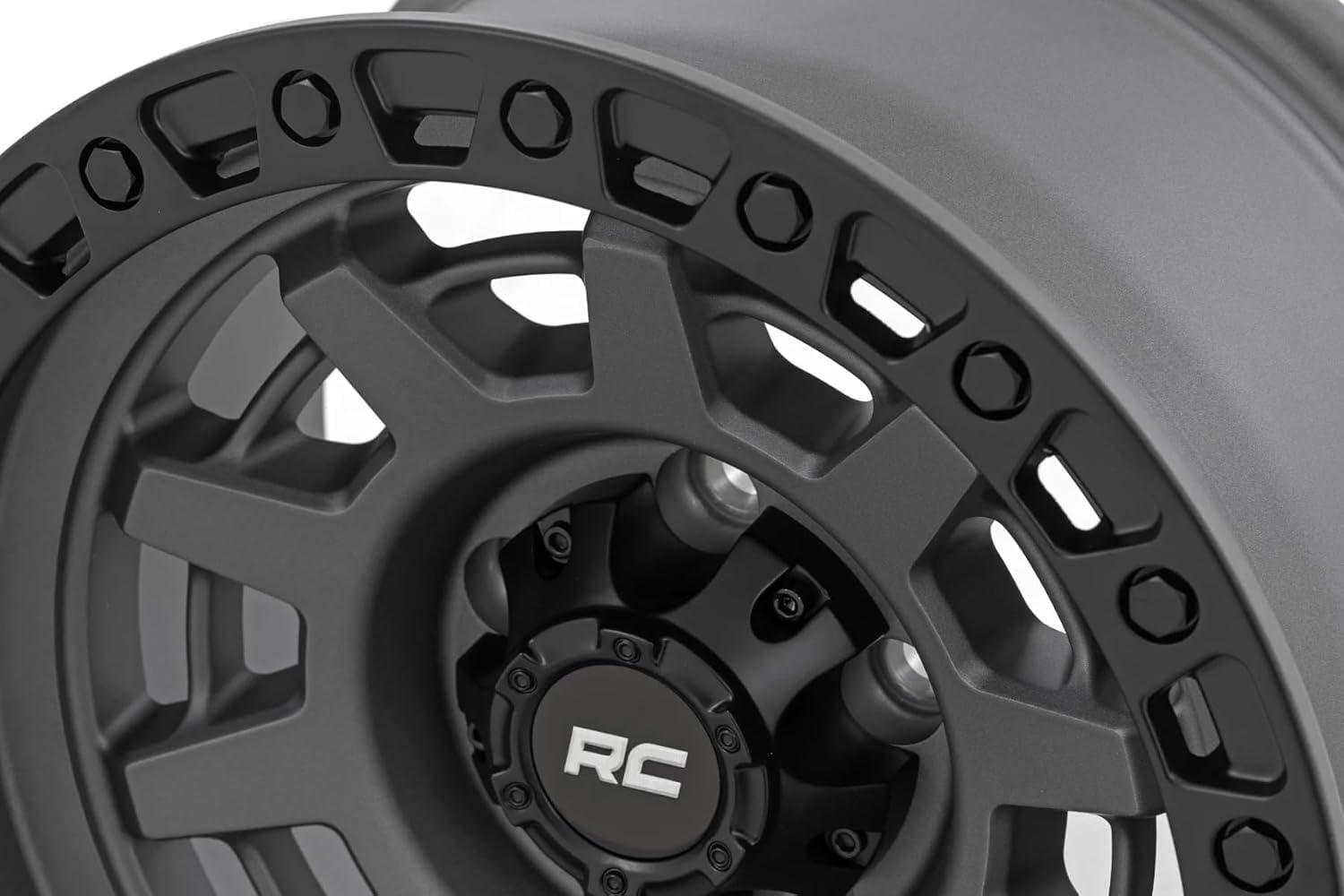 85 Series Rough Country One-Piece Aluminum Wheel with Simulated Beadlock - 15x8, 5x5.5" Bolt Pattern, 19mm Offset, Gunmetal Gray/Black