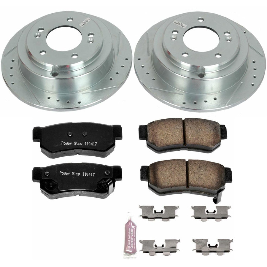 Power Stop K5917 Z23 Rear Carbon Fiber Brake Pads with Drilled & Slotted Brake Rotors Kit For Kia Amanti 2004-2006 [Model Specific]