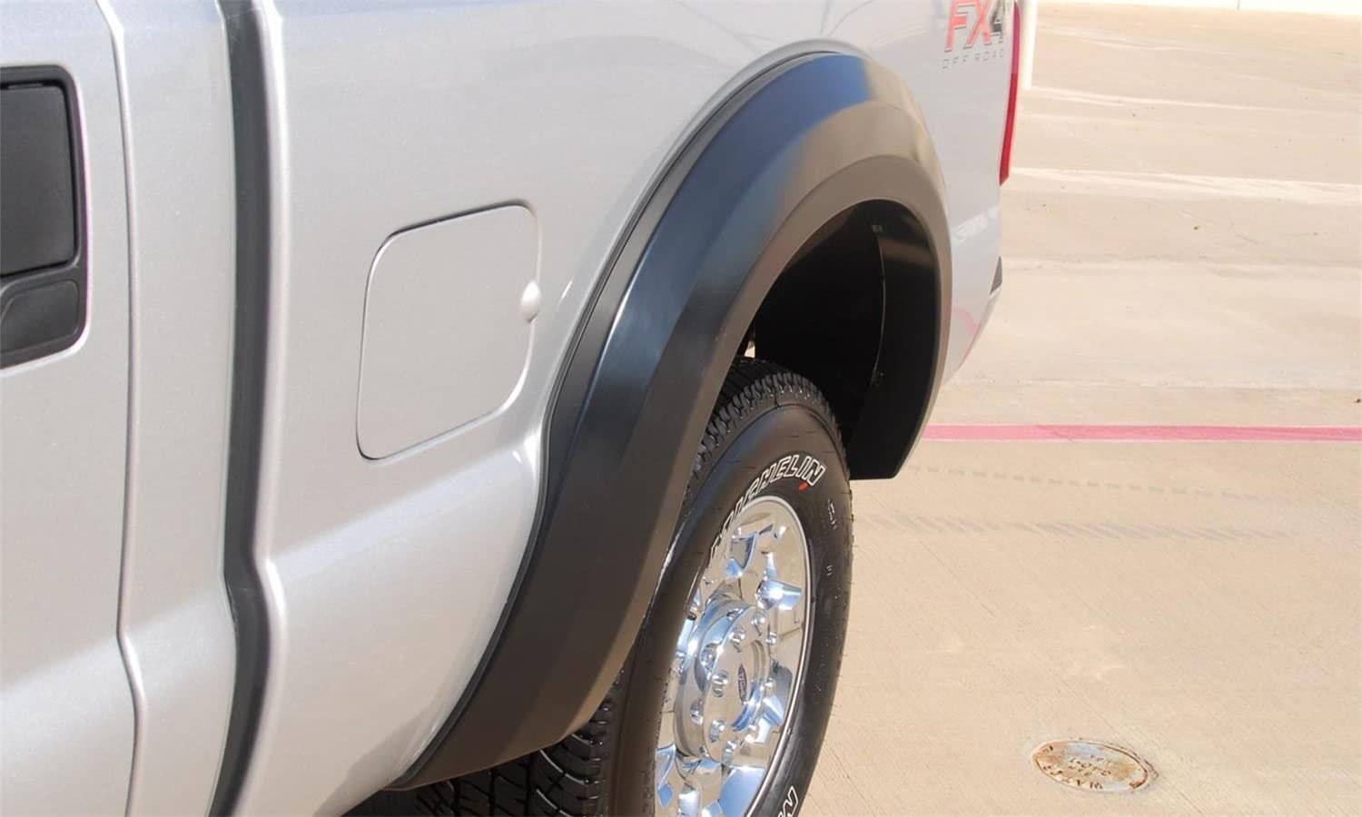 Lund Elite Series EX314S Black Extra Wide Style Standard Front and Rear Fender Flare - 4 Piece
