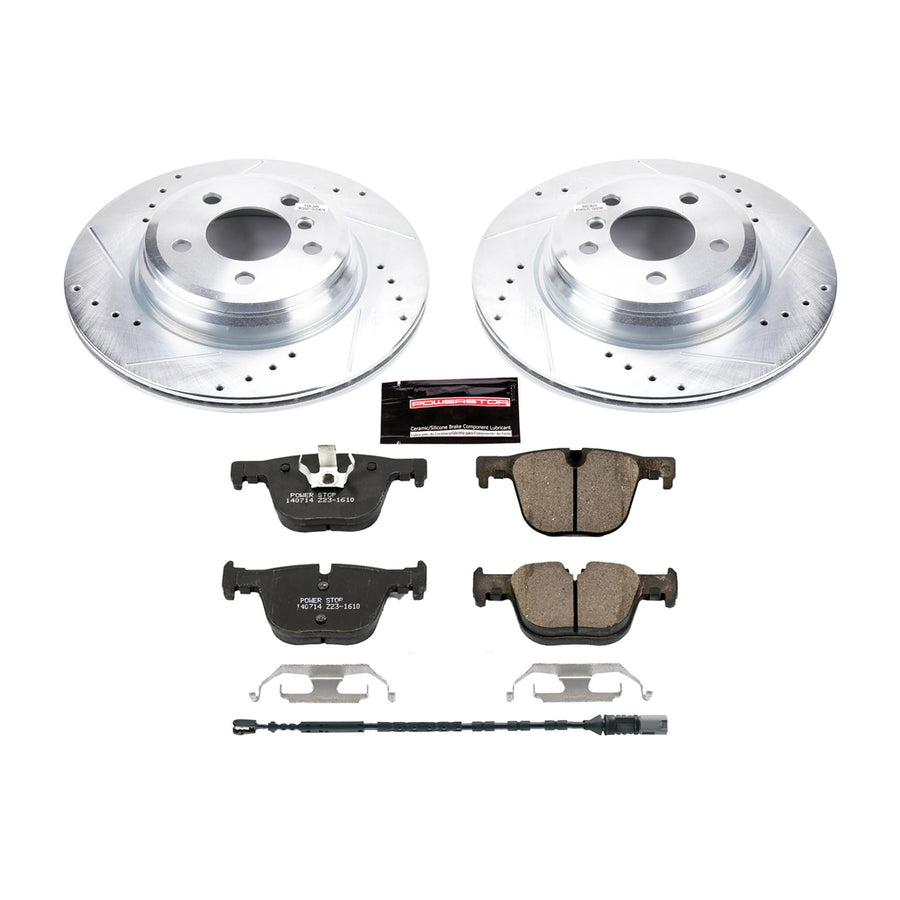 Rear Power Stop K6667 Z23 Carbon Fiber Brake Pads with Drilled & Slotted Brake Rotors Kit and 1 Rear Sensor Wire