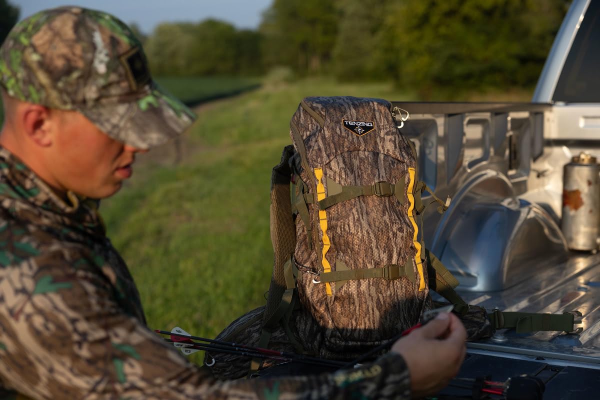 Whitetail Day Pack TENZING 2300, Mossy Oak Bottomlands | Rugged Durable Camo Hunting Backpack with 4 Compartments & 13 Organizational Pockets, Hydration Bladder Compatible