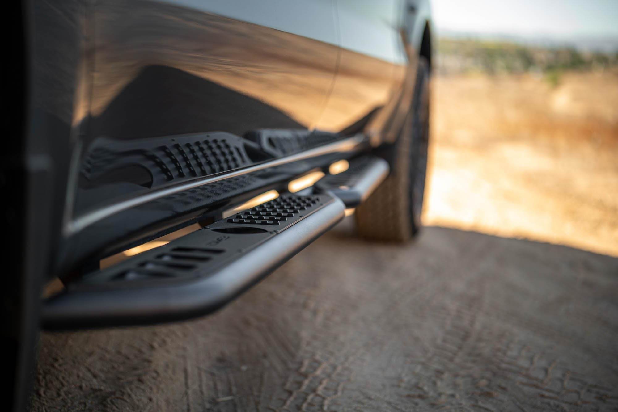 DV8 Offroad OE Plus Side Steps for 2019-2024 Chevy Silverado 1500 & GMC Sierra 1500 Crew Cab | Anti-Slip Design | Provides Protection from Light Trail Debris | Low-Profile Fitment | Powder Coated
