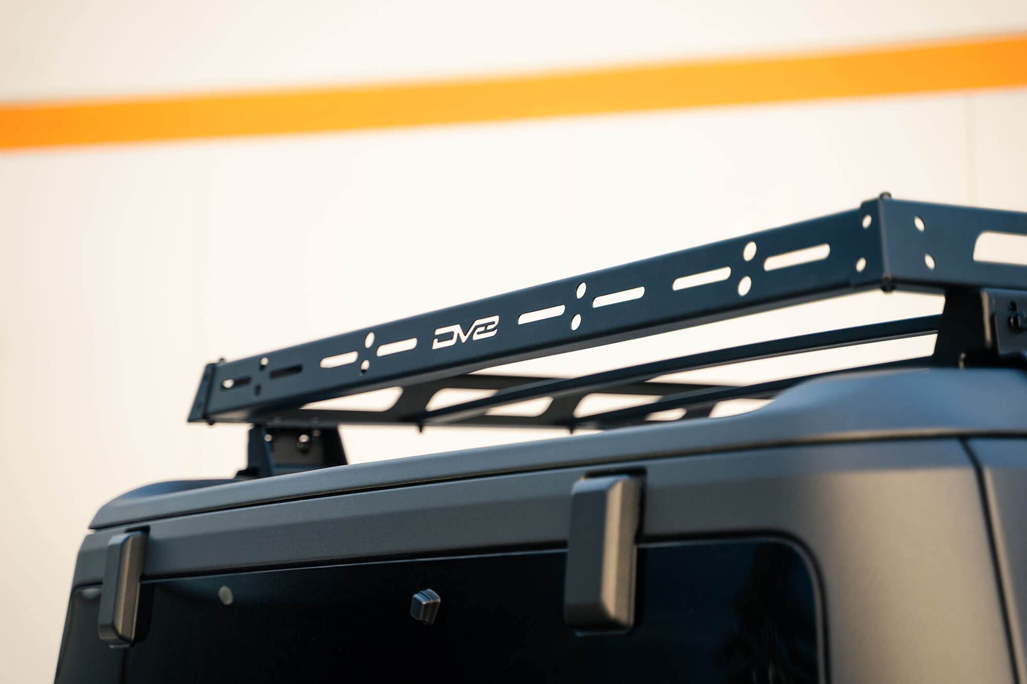 Hard Top Roof Rack DV8 Offroad for 2021-2025 Ford Bronco 4-Door | OEM Hardtop | Mounts 40” & 50” Light Bar | Bolt-On Installation | Multiple Tie Down Points | 200 lb Capacity | Multiple Accessories