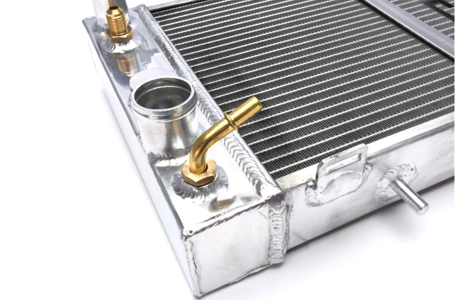 COLD - CASE Radiator, XD, 34 in W x 11 in H x 2.5 in D, Driver Side Outlet, Passenger Side Inlet, Aluminum, Polished