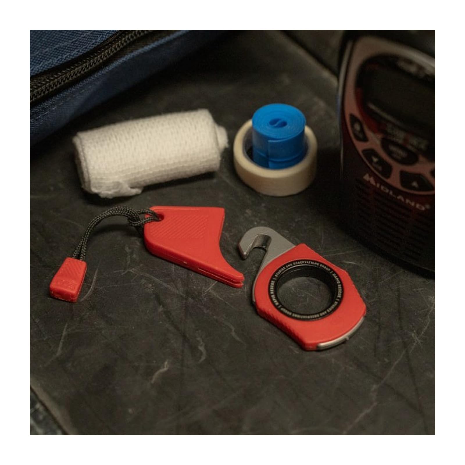 Rapid Rescue SOG Multi-Tool | Stainless Steel Seatbelt Cutter, GRN Handle, Aluminum Pull-Ring, Quick to Deploy from The Sheath, Rescue Red
