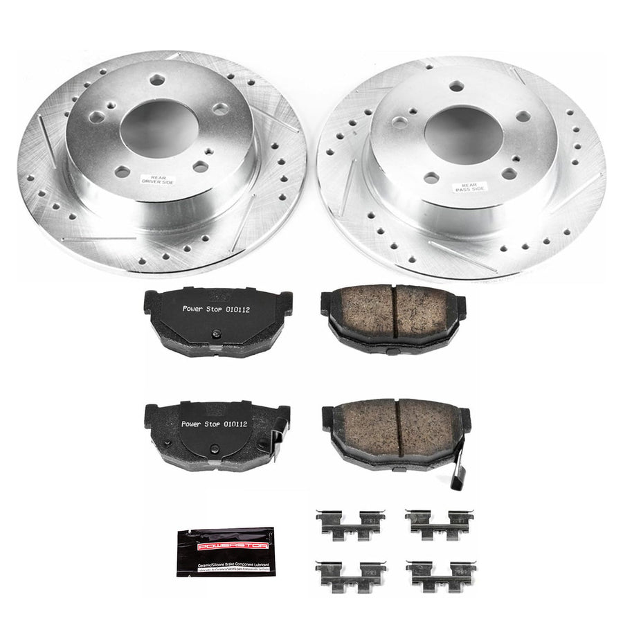 Rear Power Stop K1174 Z23 Carbon Fiber Brake Pads with Drilled & Slotted Brake Rotors Kit For Nissan 240SX 1994-1998 [Model Specific]
