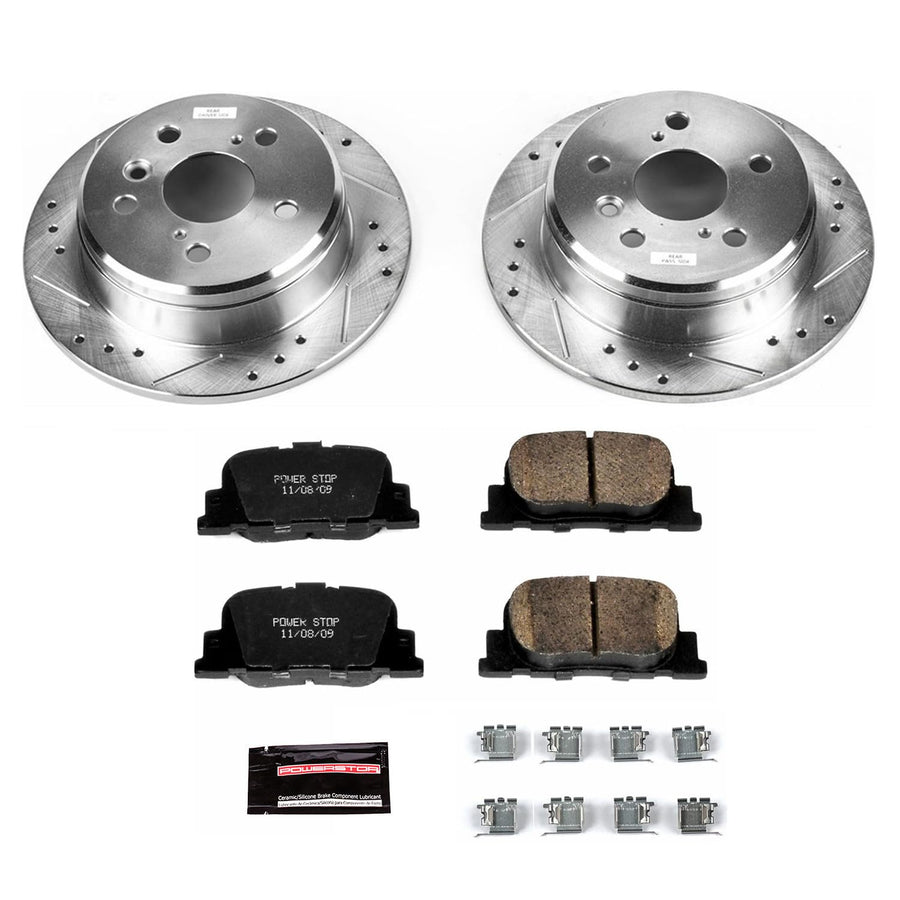Rear Power Stop K1084 Z23 Carbon Fiber Brake Pads with Drilled & Slotted Brake Rotors Kit For Lexus ES300 2000-2001, Toyota Camry 2000-2001 [Model Specific]