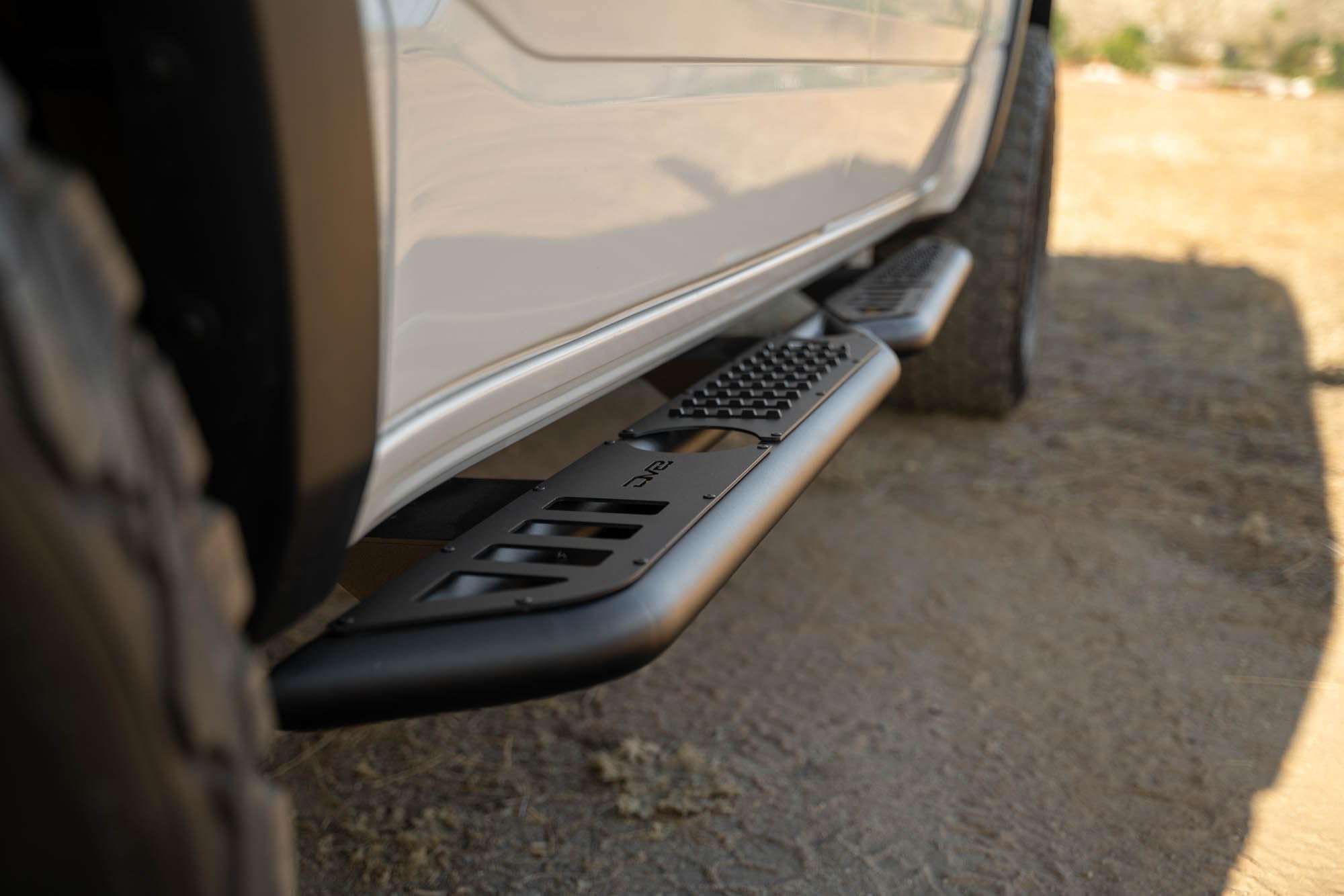 OE Plus DV8 Offroad Side Steps for 2019-2024 RAM 1500 Crew Cab | Anti-Slip Design | Provides Protection from Light Trail Debris | Mounts to Body/Pinch Weld | Retains OEM Ground Clearance | Steel
