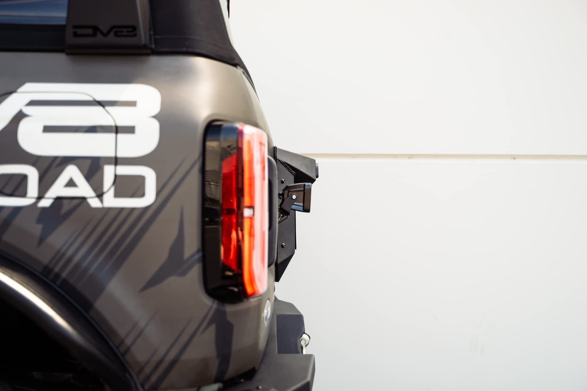 Spare Tire Delete DV8 Offroad for The 2021-2025 Ford Bronco | Integrates Backup Camera, Third Brake Light, & License Plate Light | Quick Installation | Includes Pod Light Mount