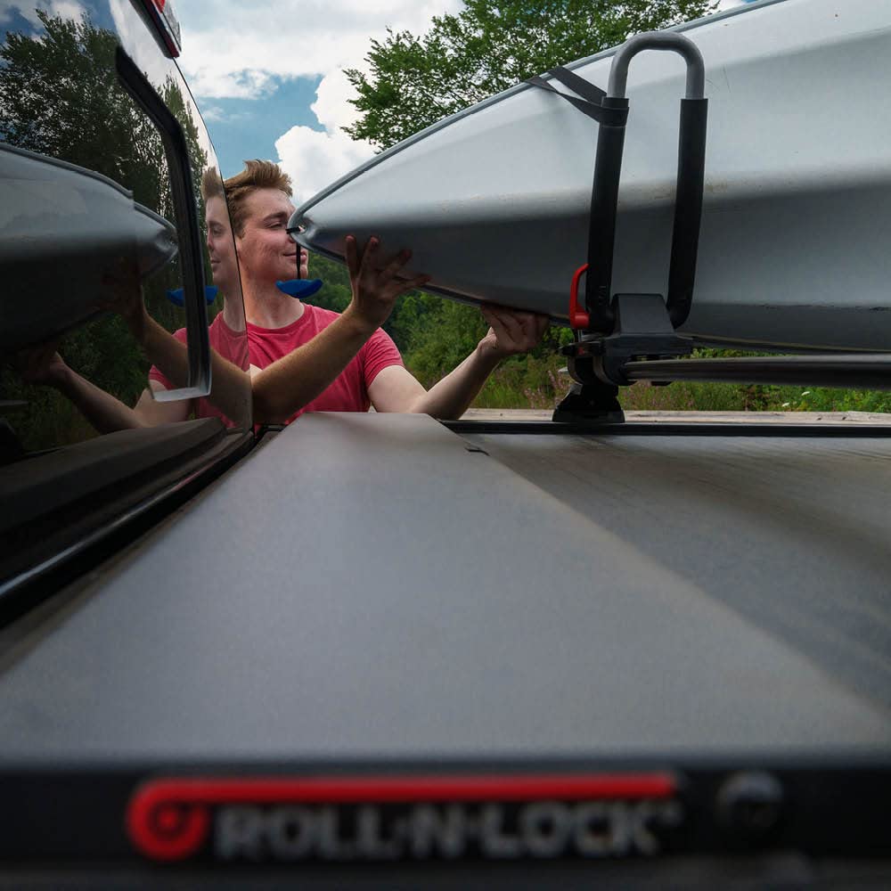 Roll-N-Lock M-Series XT Retractable Truck Bed Tonneau Cover | 402M-XT | Fits 2019 - 2025 Dodge Ram 1500/2500/3500, Does Not Fit w/ Multi-Function (Split) Tailgate 6' 4" Bed (76.3")