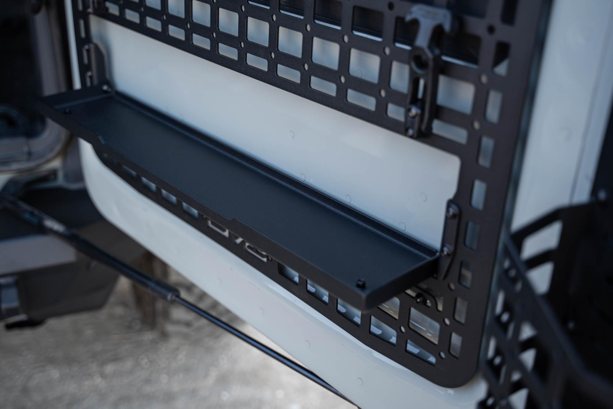 Tailgate Molle Panel DV8 Offroad for The 2021-2025 Ford Bronco | Perfect for Molle Bags, Knife Sheaths, Med Kits, Recovery Gear & More | Drop-Down Tray for Holding Drinks & Other Gear While at Camp