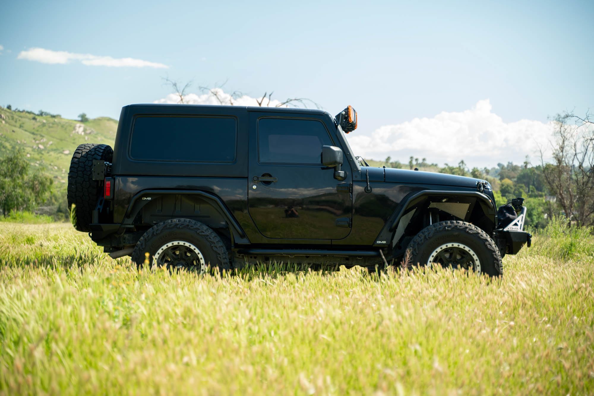DV8 Offroad Fender Flares Spec Series for 2007-2018 Jeep Wrangler JK | Offers Improved Tire Clearance | Included Plug & Play Amber Marker Lights | Tube & Plate Steel Design | Black Powder Coat
