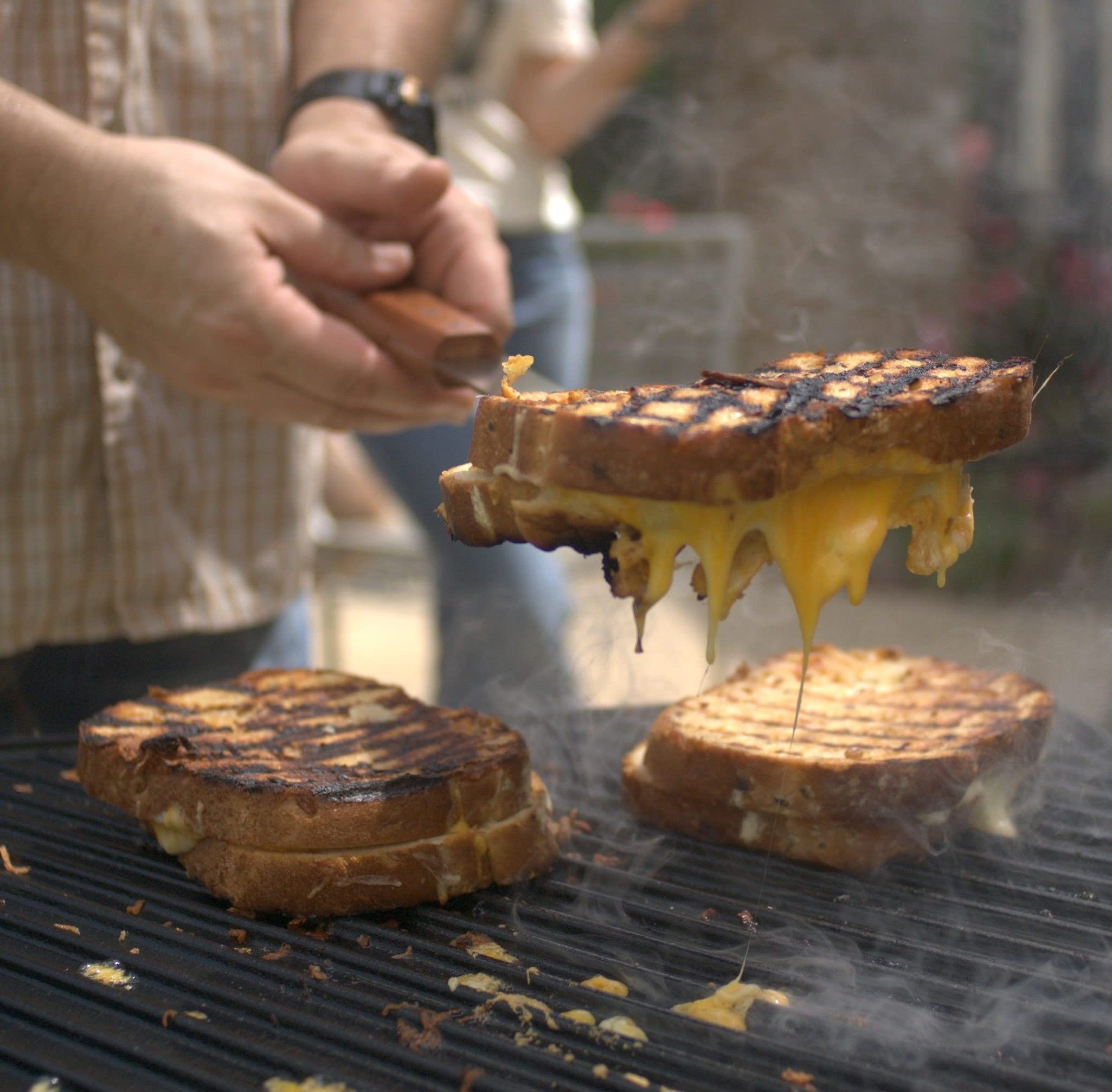 Bayou Classic 28-in Cast Iron Reversible Griddle Features Flat Side and Ribbed Grill Side Perfect For Large Batch Breakfast Burgers and Grilled Sandwiches Steaks and Chicken