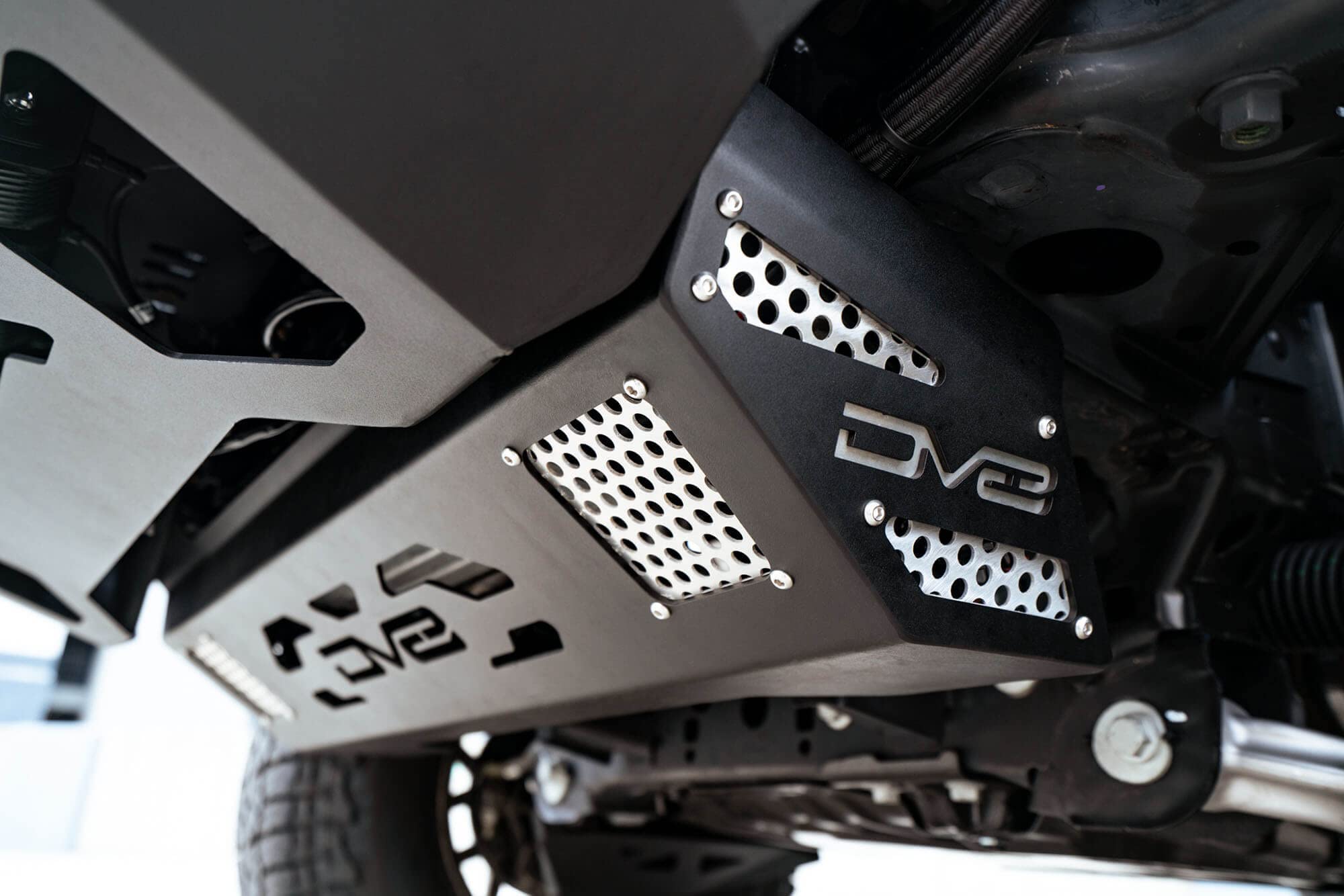 Steel Front Skid Plate DV8 Offroad for 2021-2025 Ford Bronco | Protects Front Underbody | Paintable Aluminum Inserts | Bolt-on Installation | Black Finish
