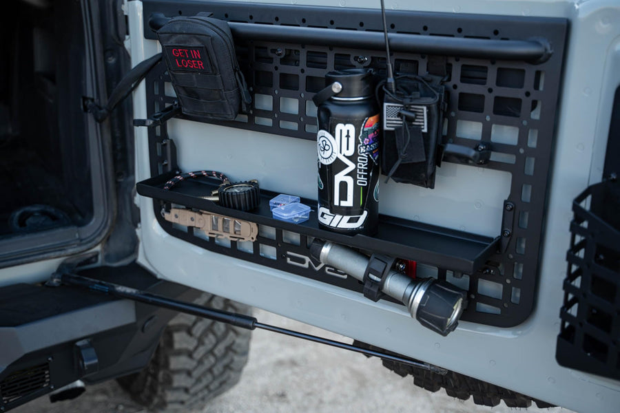 Tailgate Molle Panel DV8 Offroad for The 2021-2025 Ford Bronco | Perfect for Molle Bags, Knife Sheaths, Med Kits, Recovery Gear & More | Drop-Down Tray for Holding Drinks & Other Gear While at Camp