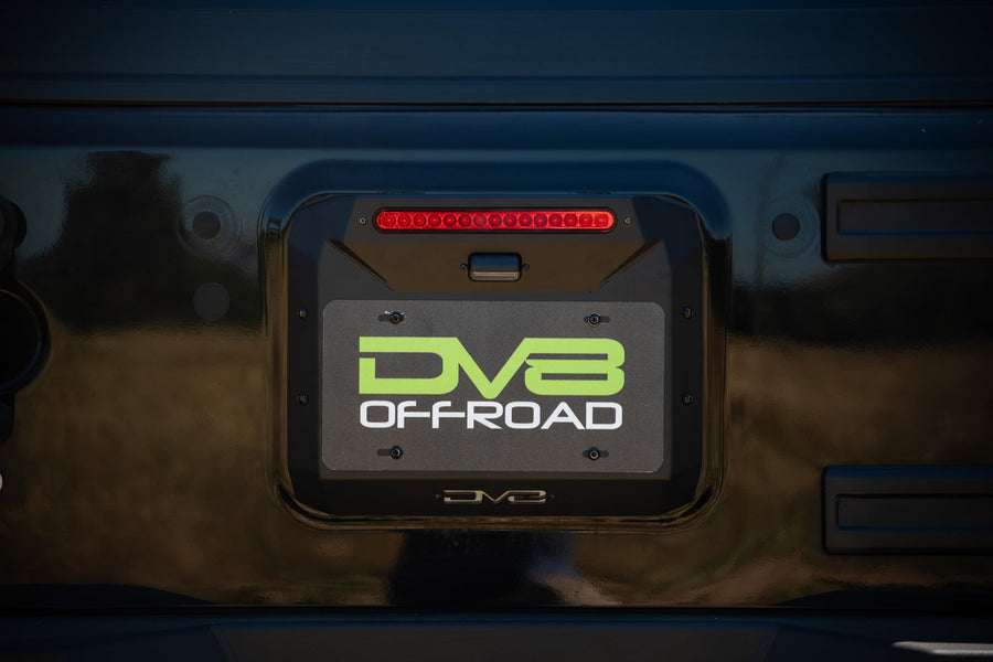 Spare Tire Delete DV8 Offroad for 2007-2018 Jeep Wrangler JK | Replaces Spare Tire Assembly | Maximizes Departure Angle | Features LED License Plate Light | Included Rubber Plugs
