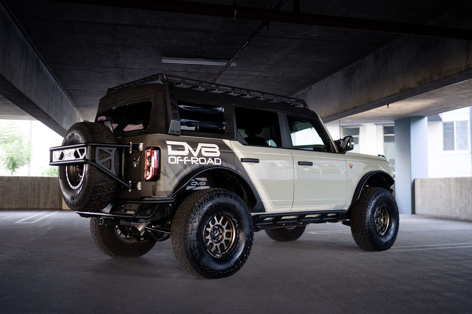 Soft Top Roof Rack DV8 Offroad for 2021-2025 Ford Bronco 4-Door | Bolt-On Installation | Multiple Tie Down Points | 200 lb Capacity | Multiple Accessories