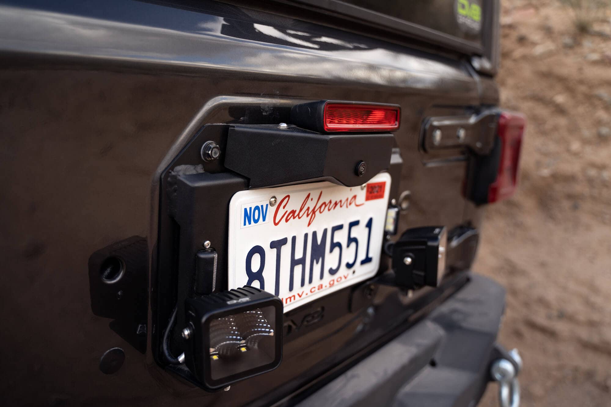 Delete Spare Tire Kit for 2018-2022 Jeep Wrangler JL | Includes 2 Pod Light Mounts | Retains OEM Back Up Camera & 3rd Brake Light | License Plate Bracket Included | DV8 Offroad