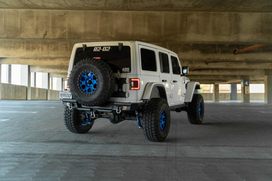 MTO Series DV8 Offroad Rear Bumper for 2018-2025 Jeep Wrangler JL | Full Width Matching Factory & Aftermarket Fenders | Compatible w/Factory Hitch & Harness | OEM Mount Can Fit up to a 37” Spare Tire
