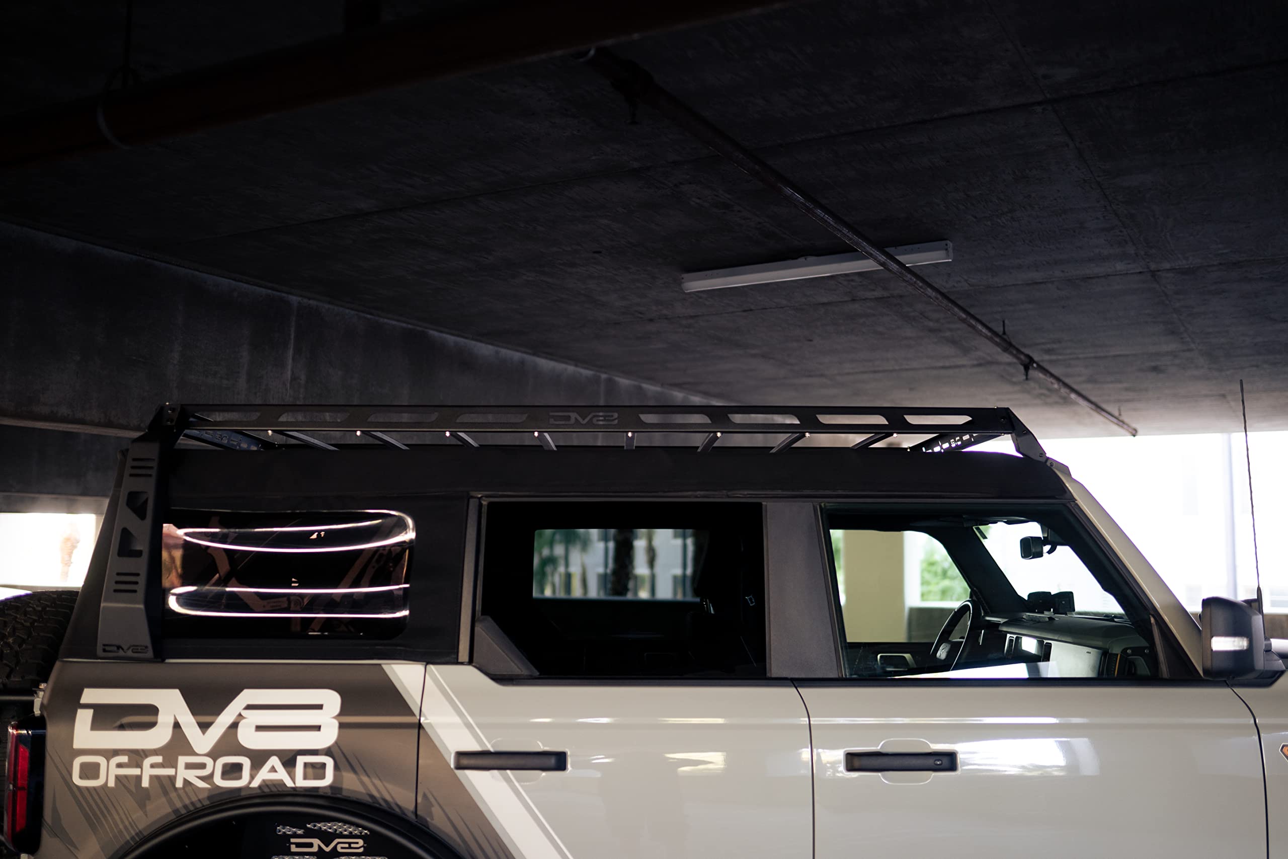 Soft Top Roof Rack DV8 Offroad for 2021-2025 Ford Bronco 4-Door | Bolt-On Installation | Multiple Tie Down Points | 200 lb Capacity | Multiple Accessories