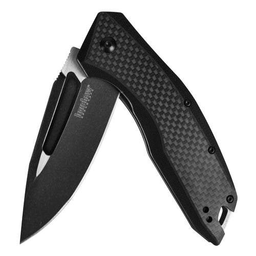 Kershaw Pocket Knife Flourish (3935); 3.5-Inch Blackwash Clip Point Blade with Black Carbon Fiber Handle; Features SpeedSafe Assisted Opening, Flipper, Lanyard Hole and Reversible Pocket Clip; 5.3 OZ.