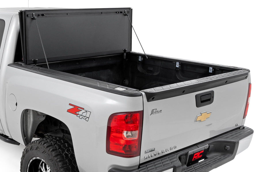 Rough Country Hard Tri-Fold Truck Bed Flip Up Tonneau Cover for Chevy Silverado and GMC Sierra 1500 (2007-2013) - Fits 5'9 (69.3") Bed with Rail Caps