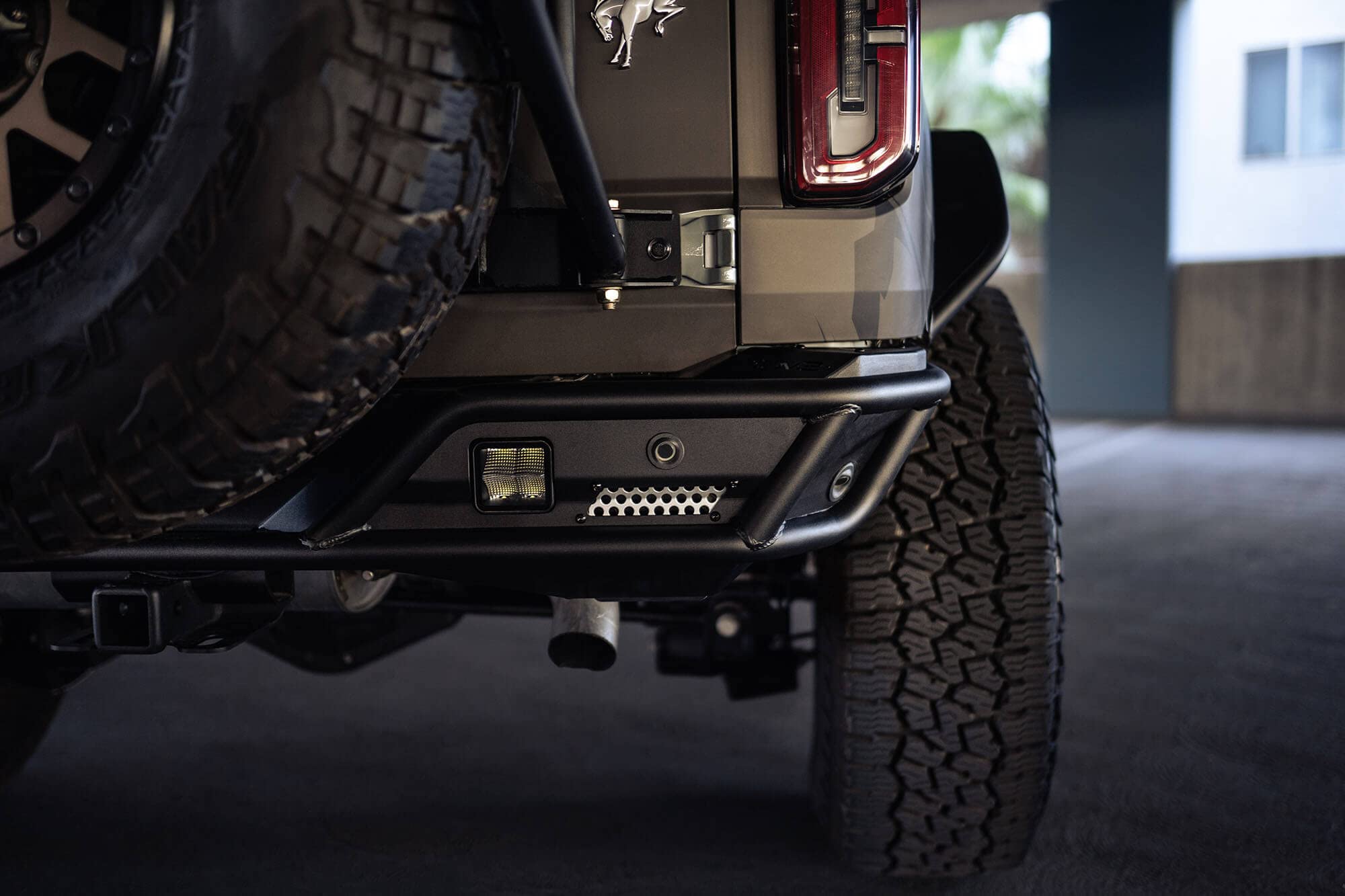 Rear Bumper Competition Series for 2021-2025 Ford Bronco | Fits Up to 37” Spare Tire | Mounts Two Light Mounts that Fit 3” Light Pods | Low Profile | DV8 Offroad