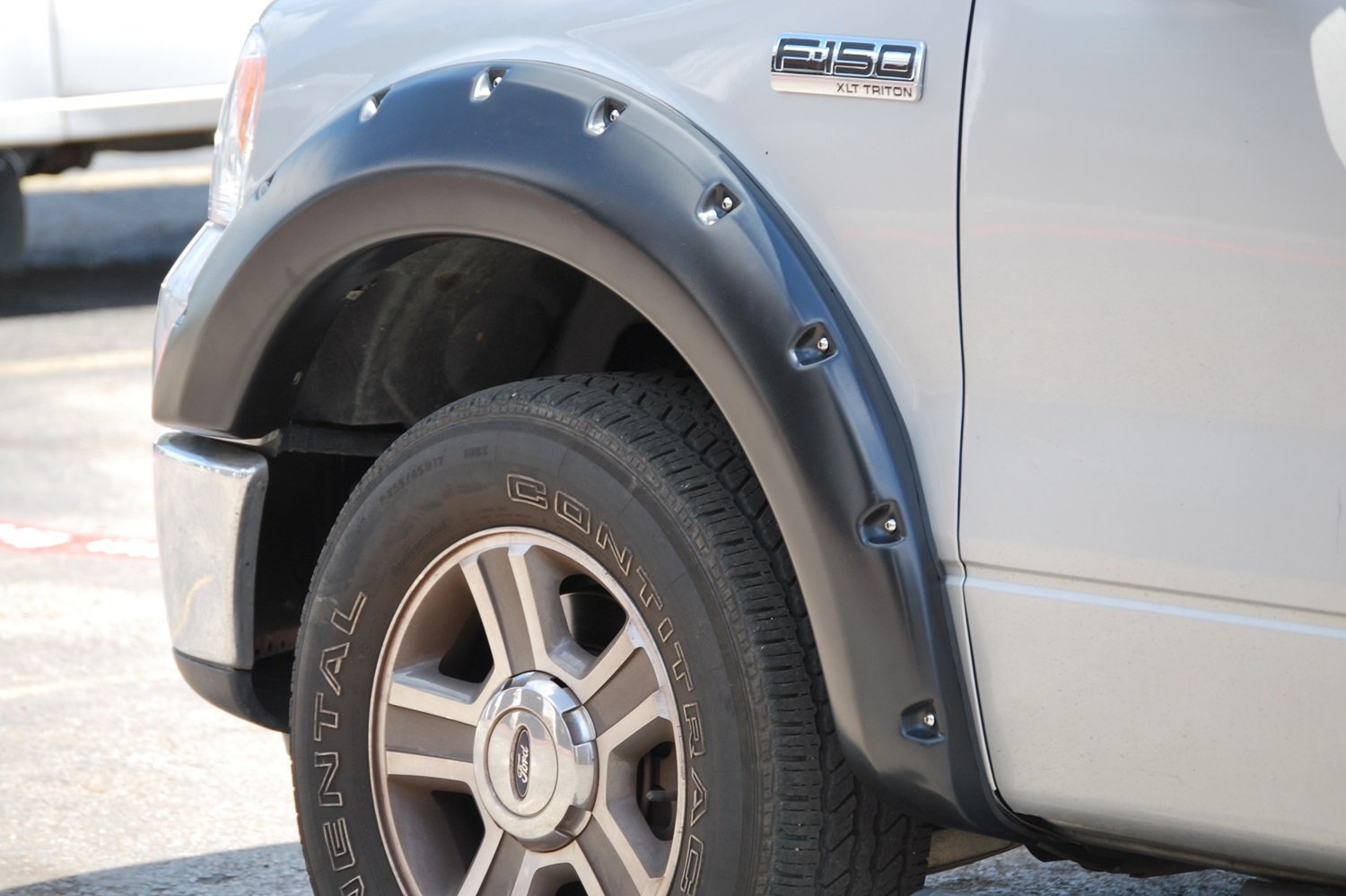 Lund Elite Series RX310S Black Rivet Style Standard Front and Rear Fender Flare - 4 Piece