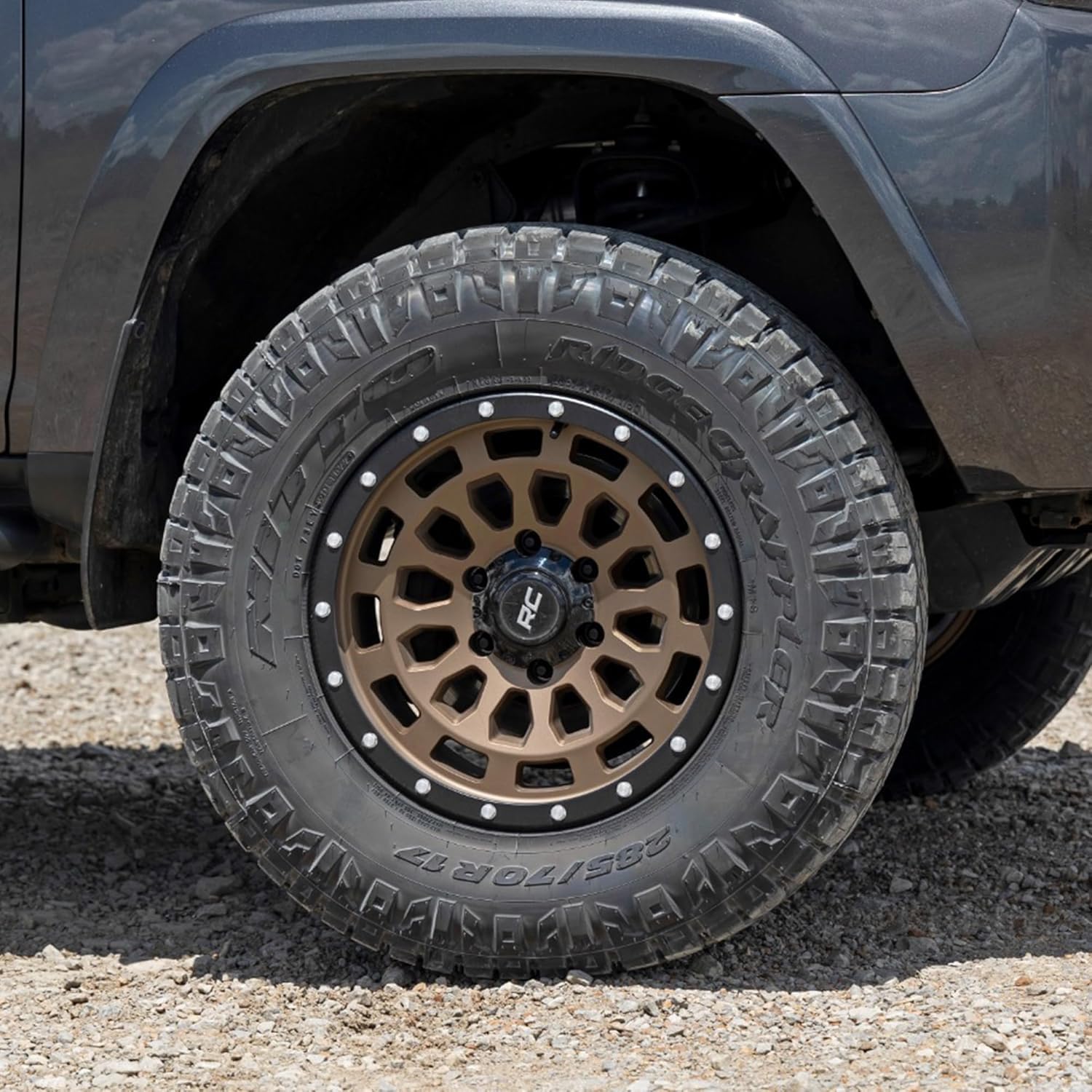 17x8.5" Rough Country 87 Series Bronze Aluminum Wheel with Black Ring & Simulated Beadlock - 6x5.5 Bolt Pattern, +0mm Offset, Durable One-Piece Rim for Trucks & Jeeps