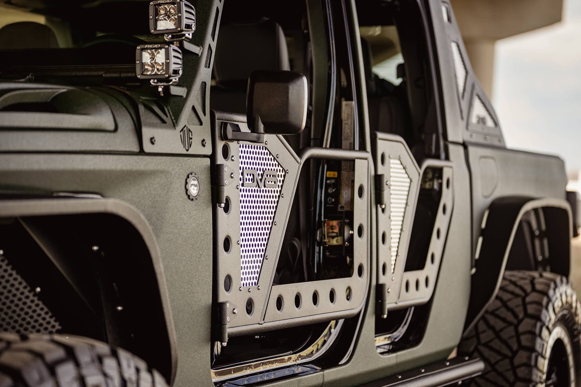 Rock Doors for Wrangler JL & Gladiator JT | DV8 Offroad | RDJL-01F | Tubular Design | Anti Rattle Stopper | Aluminum Mesh Inserts | Trail Mirror Included | Black Textured Finish | Front Door Set