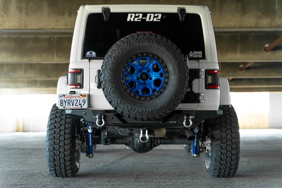 FS-15 Series DV8 Offroad Rear Bumper for the 2018-2025 Jeep Wrangler JL | Compatible with Factory Hitch | License Plate Relocation Bracket with Plate Light | Welded-in Zip Tie Tabs